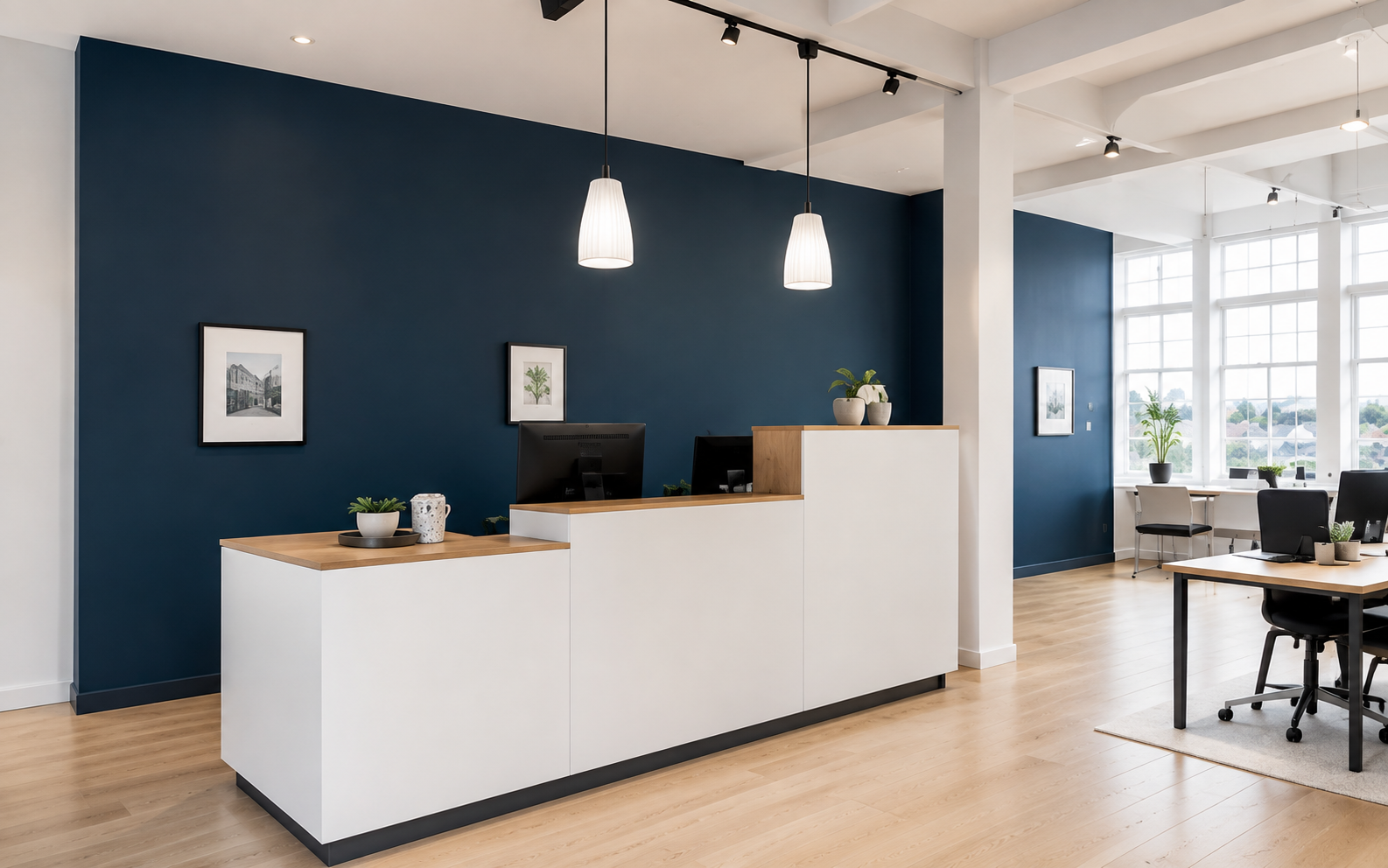 Commercial painting inspiration with navy walls and a bright white reception counter